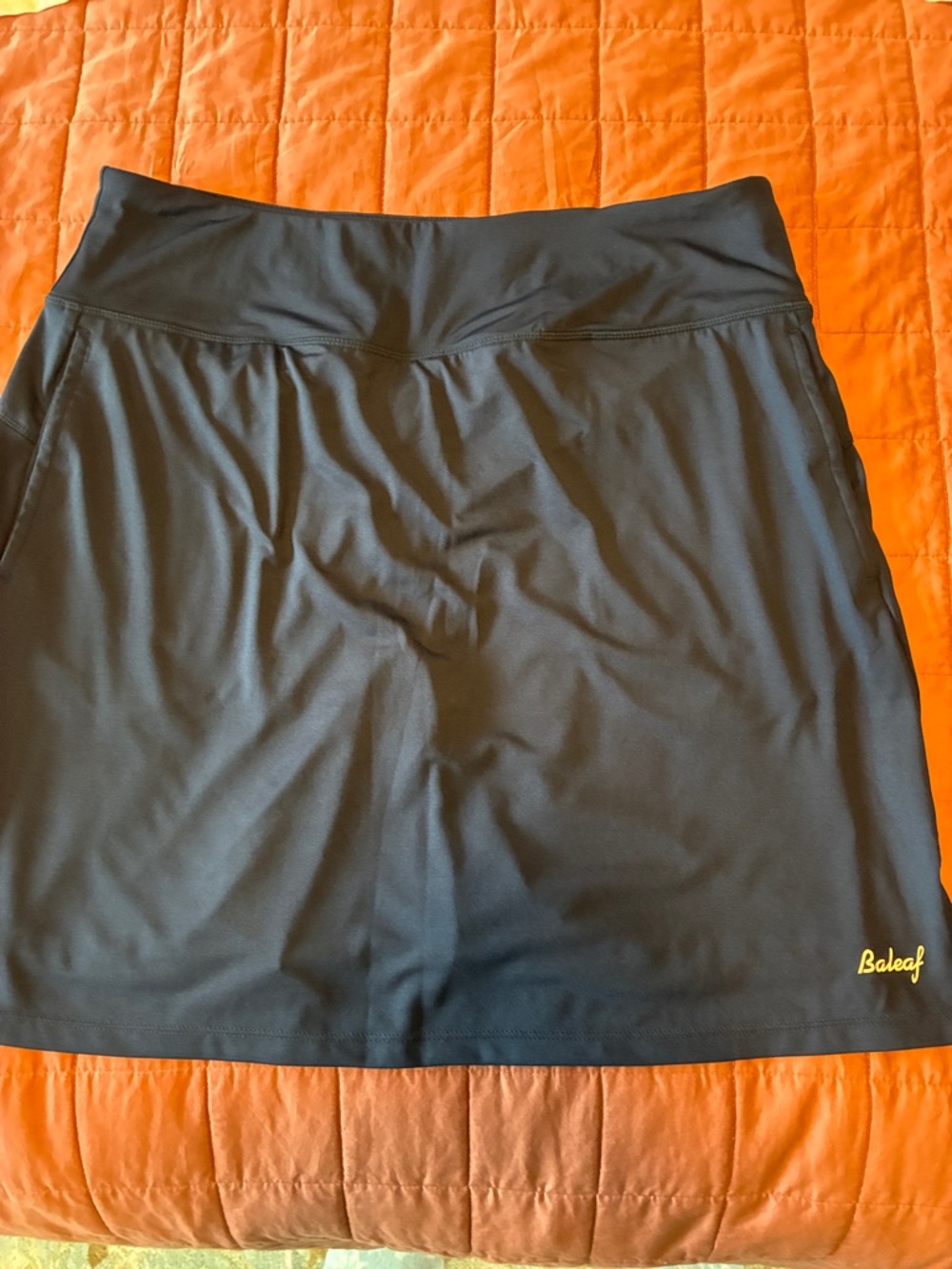 Baleaf Blue Athletic Skort with Yellow Logo NWT